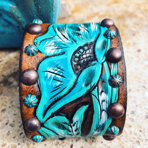 Tooled turquoise floral cuff